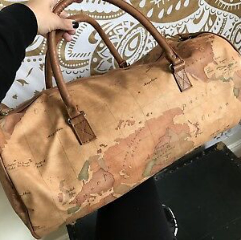 Lightly used world map duffel
